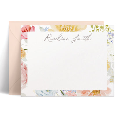 This elegant flat note card set is designed with a soft, colorful pattern of watercolor florals and your personalization in script