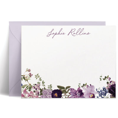 This custom note card set features a stunning array of purple flowers along with your name in an elegant script