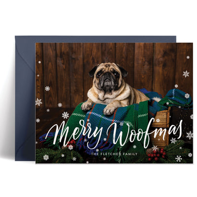 Custom Christmas card with a photo of your pet, surrounded by snowflakes and Christmas decorations.