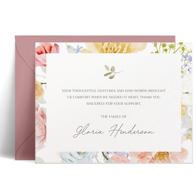 Personalized bereavement card with soft watercolor floral border, heartfelt condolence message in grey ink, elegant sympathy stationery