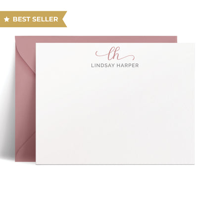 This flat card set features a beautiful script monogram along with your name