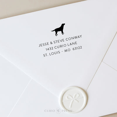 Custom address stamp with Labrador Retriever silhouette and modern printed name and address, stamped on envelope